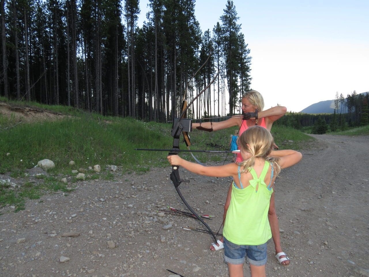 Erica and Carmyn practicing with recurves