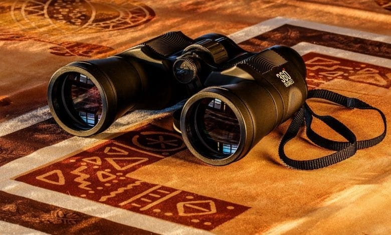 Binoculars resting on a table