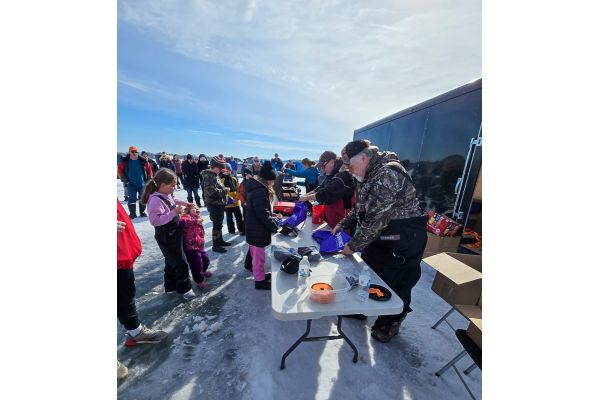 Minnesota Families Enjoy a Day of Ice Fishing Fun